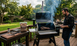 Pellet grill smoking brisket in a backyard